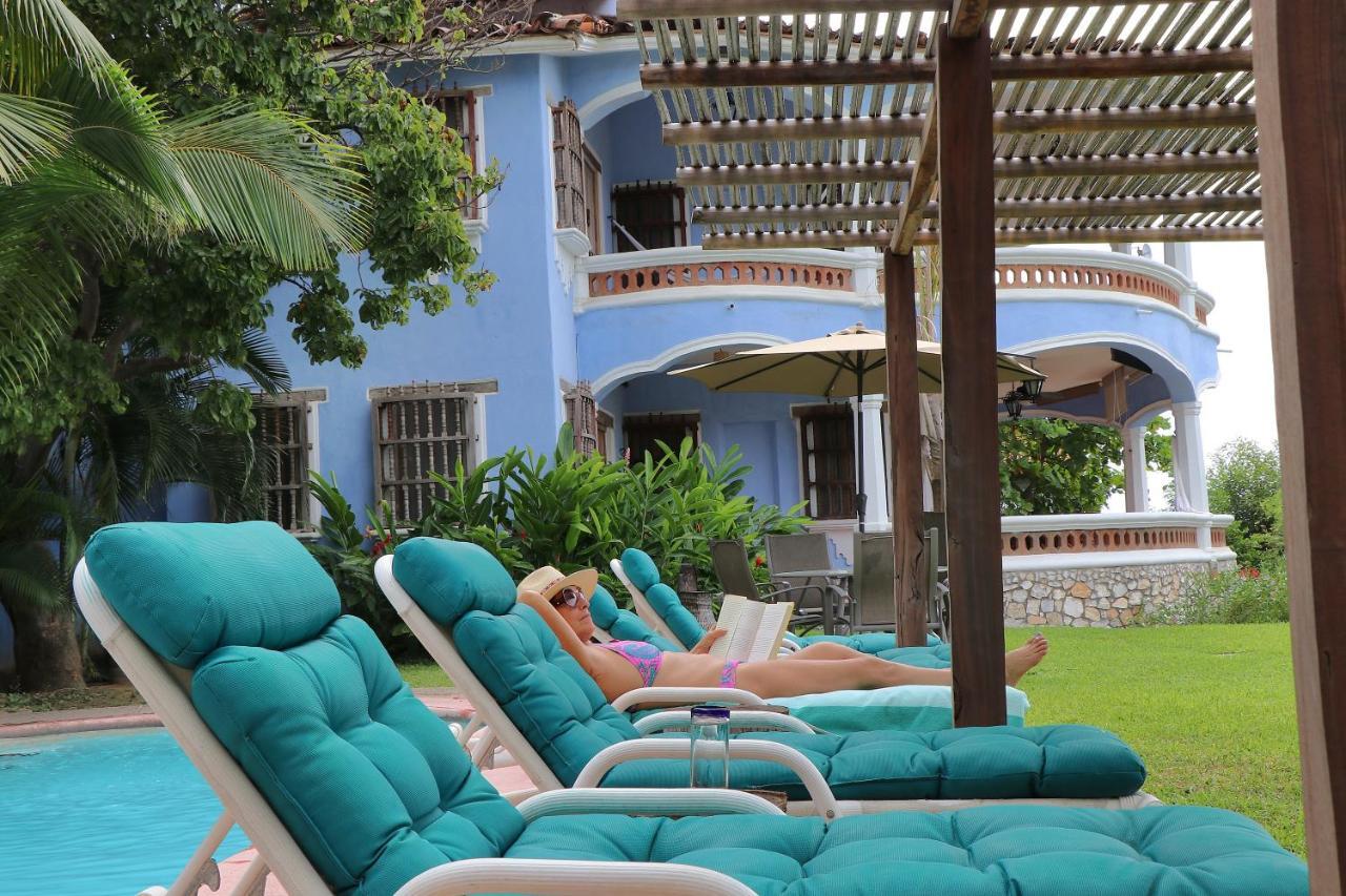 Bungalows Santa Cruz ปูแอร์โตเอสกอนดิโด ภายนอก รูปภาพ