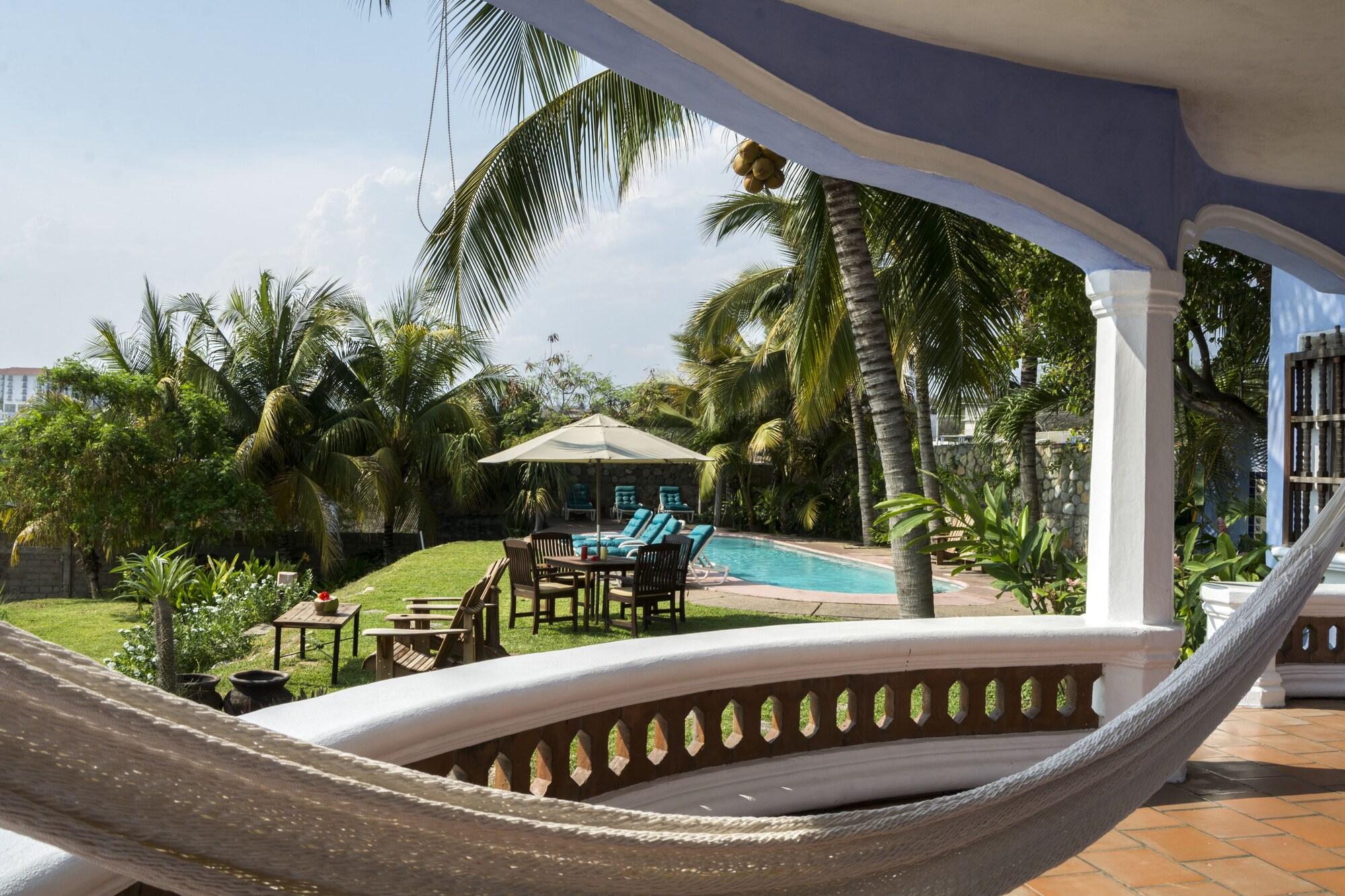 Bungalows Santa Cruz ปูแอร์โตเอสกอนดิโด ภายนอก รูปภาพ